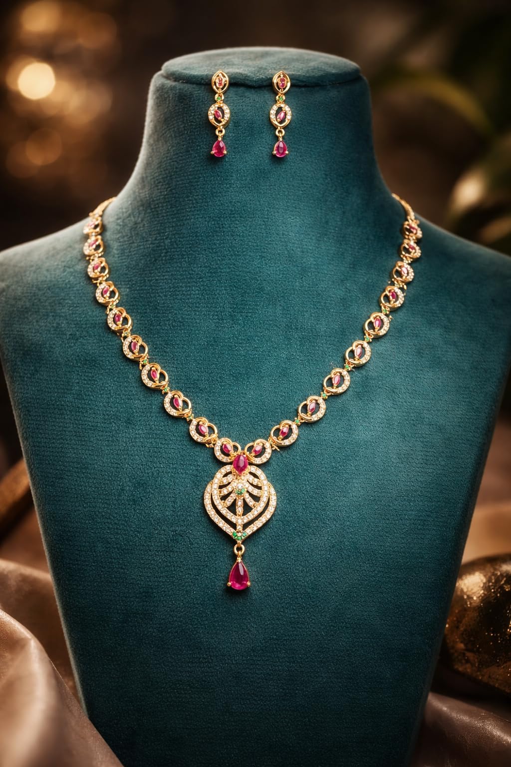 KAYRAH Gold Plated Brass Jewellery Set with Red Cubic Zirconia Stones, Drop Earrings, Fashion Style, for Wedding & Festive with Matching Earrings with Matching Earrings