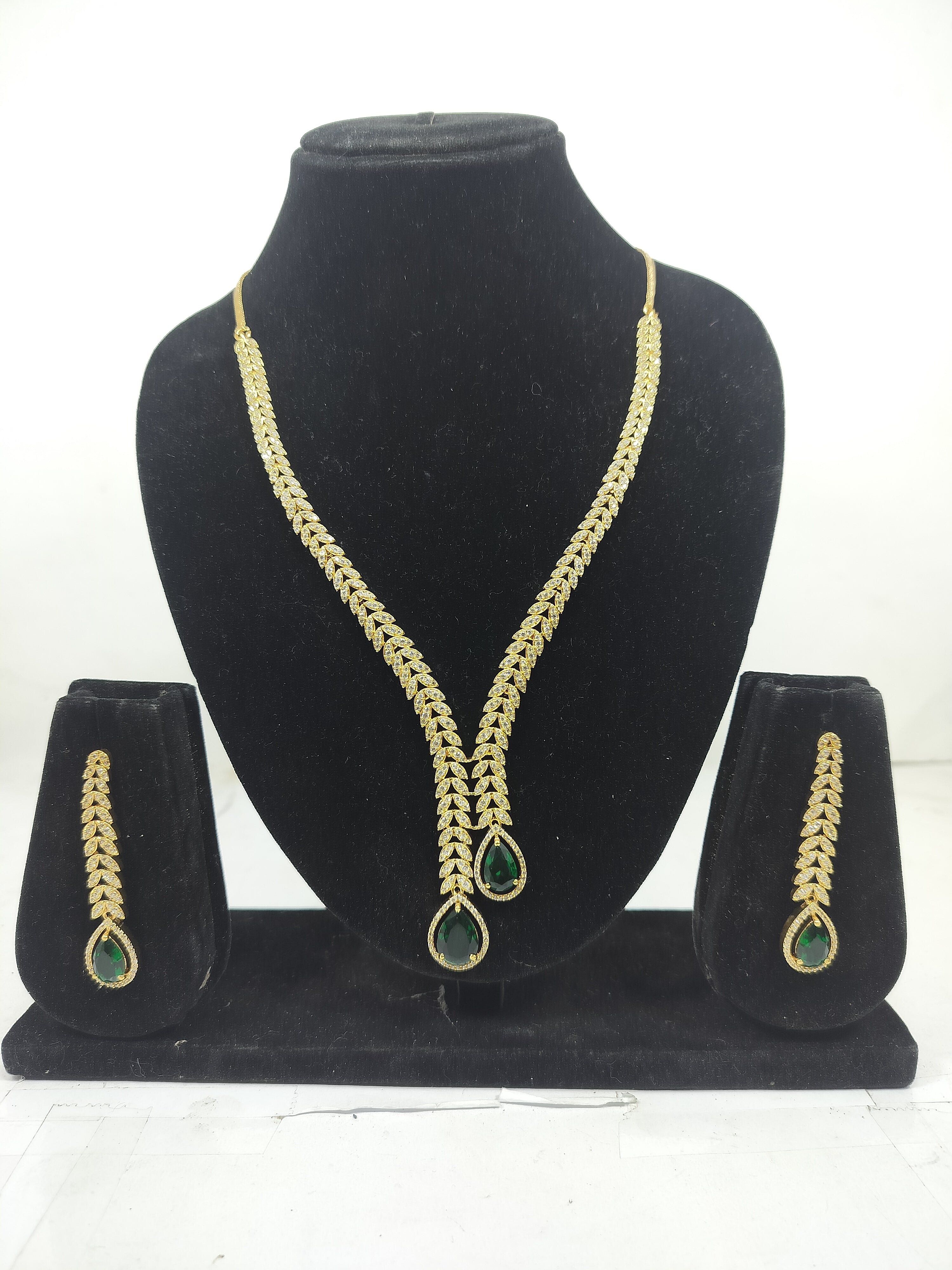 Kayrah Gold Tone Green Stone Leaf Design Necklace Set with Earrings